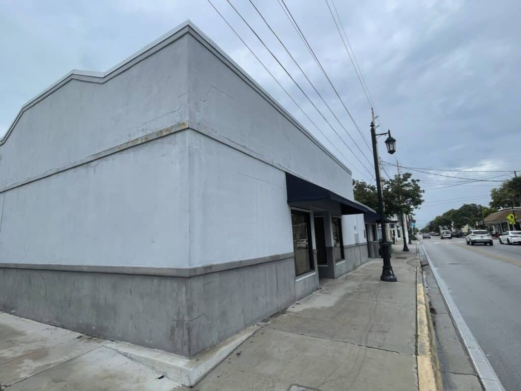 commercial building with concrete spalling cracks